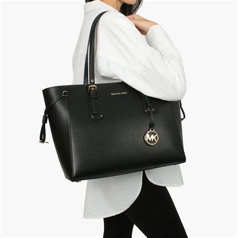 what kind of bags are similar to michael kors voyager|Michael Kors saffiano tote.